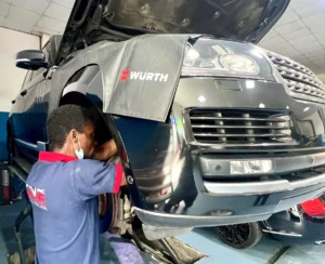 DME Auto Technician Working on Range Rover Car