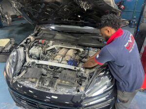 Technician Scanning Porsche at DME Auto Dubai