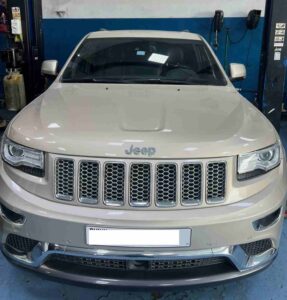 DME Technician Servicing Jeep Grand Cherokee