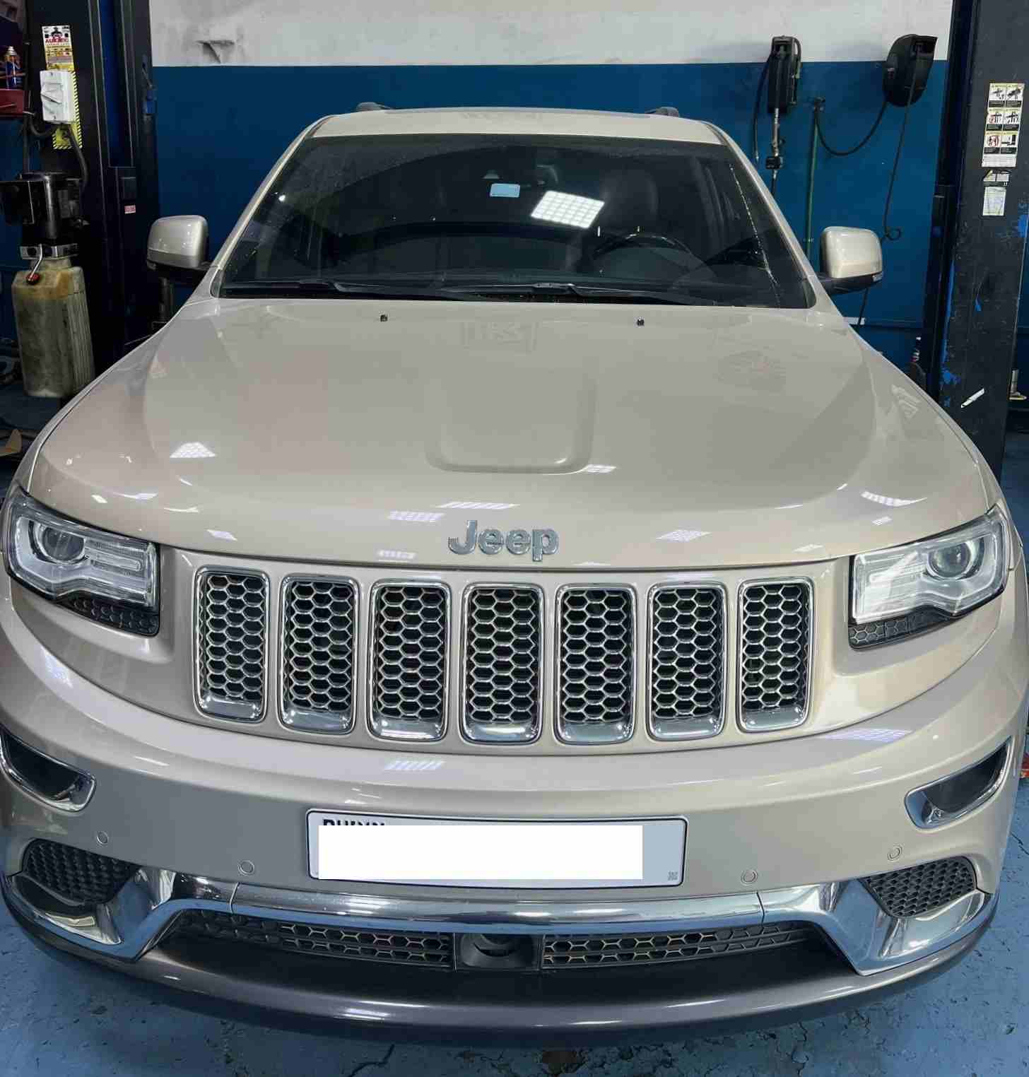DME Technician Servicing Jeep Grand Cherokee