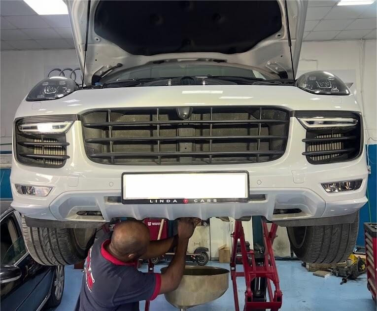 DME Mechanic Repairing Porsche